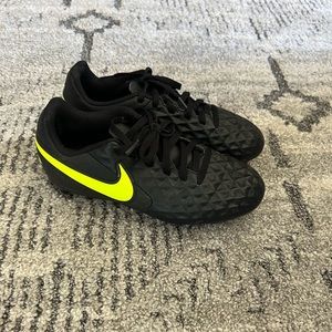 Nike size 3.5 soccer cleats black and neon green.